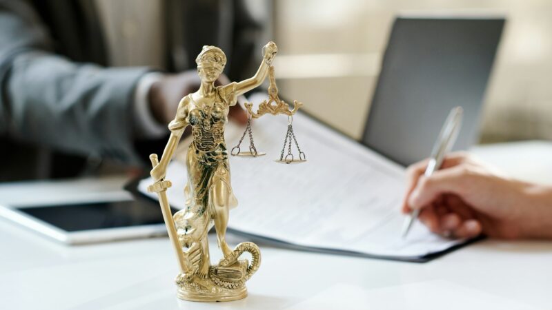 Law statuette in lawyer office